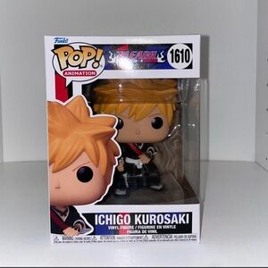 Funko Pop Animation Figure with Orange Hair and Black Outfit